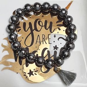 Beautiful electroplated glass bead silver snowflake ❄️ stretch bracelet w tassel